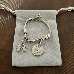 Silver Charm Bracelet with Engraved Pendant